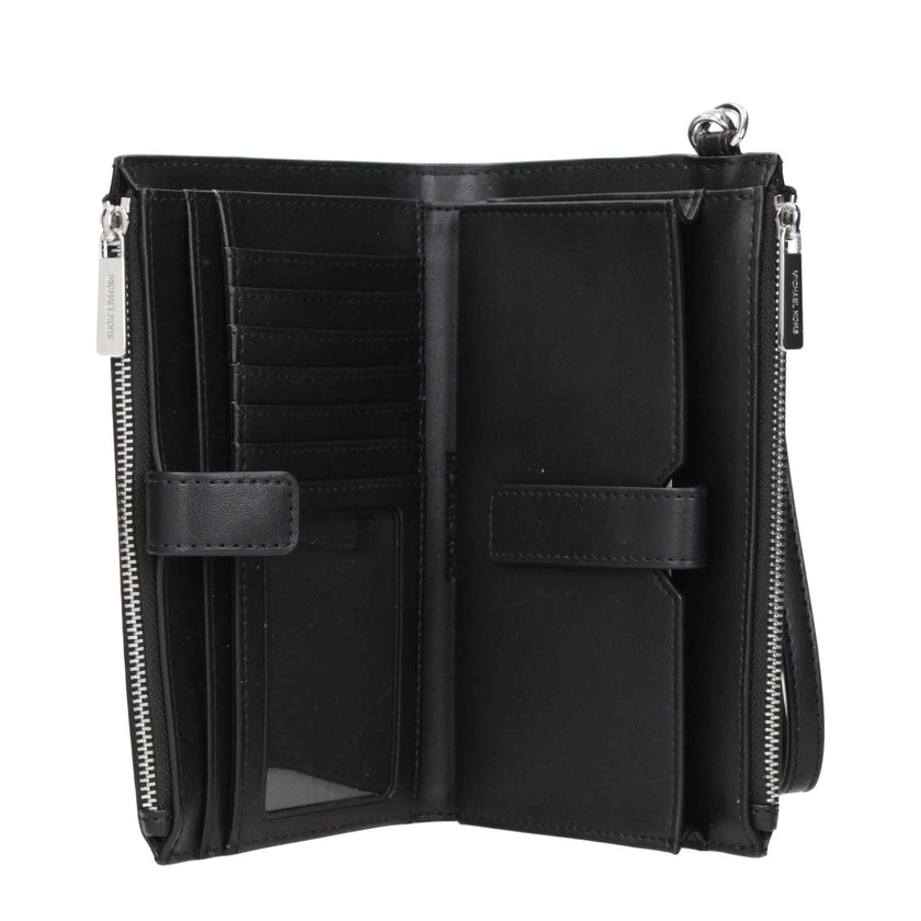 Black Fabric WalletDescription: The product with MPN 35R5STVW3VBLACK and code F85085 fabric in black is a wallets designed by Michael Kors. It has features like logo, removable handle.Black Fabric Wallet${tagsMichael KorsAulae Black Fabric Wallet Michael