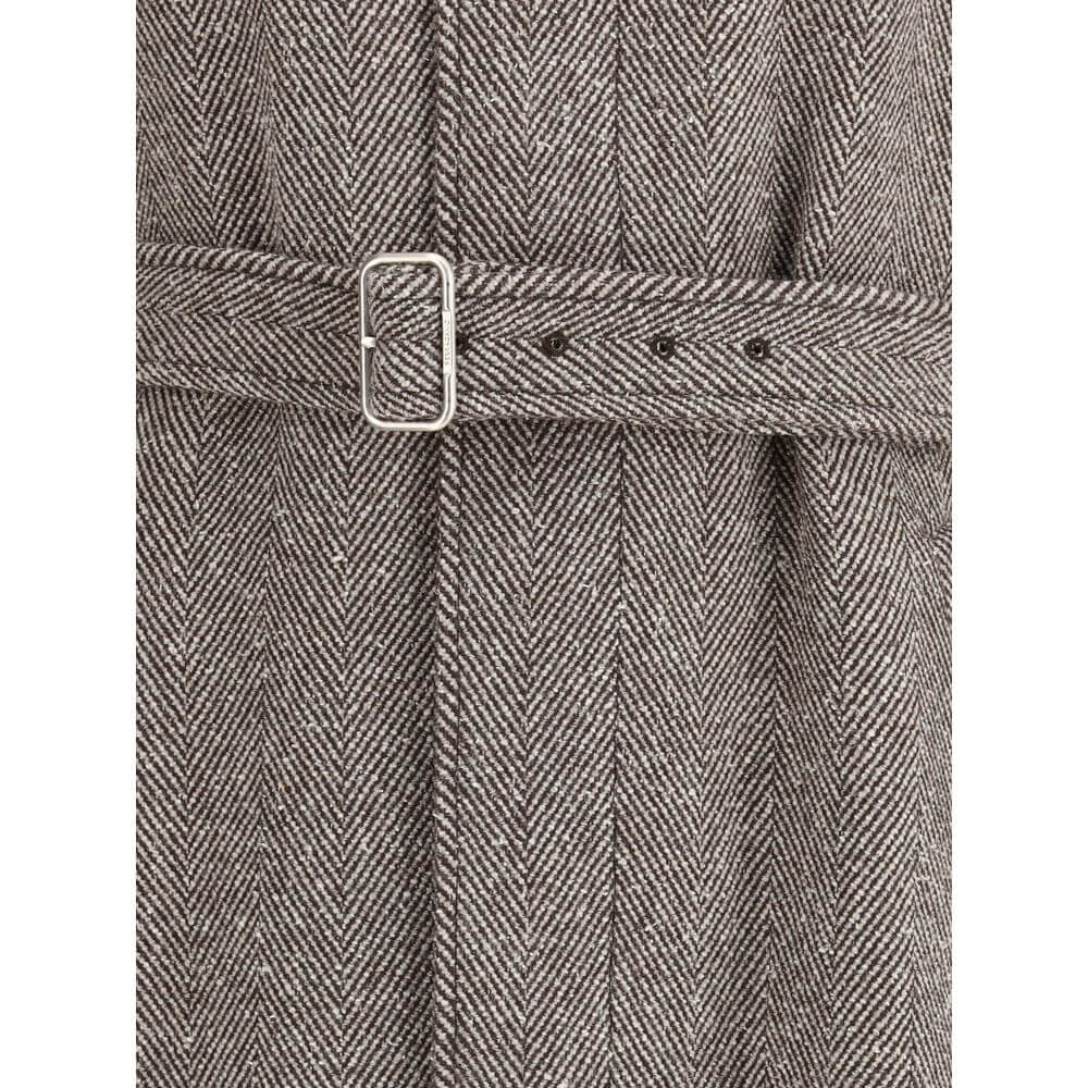 Beige Wool CoatThe Coat by Ferragamo is crafted from a refined herringbone-patterned fabric, showcasing timeless sophistication. It features a button-front closure and two front welt pockets. The structured collar includes an additional internal fastening