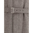 Beige Wool CoatThe Coat by Ferragamo is crafted from a refined herringbone-patterned fabric, showcasing timeless sophistication. It features a button-front closure and two front welt pockets. The structured collar includes an additional internal fastening