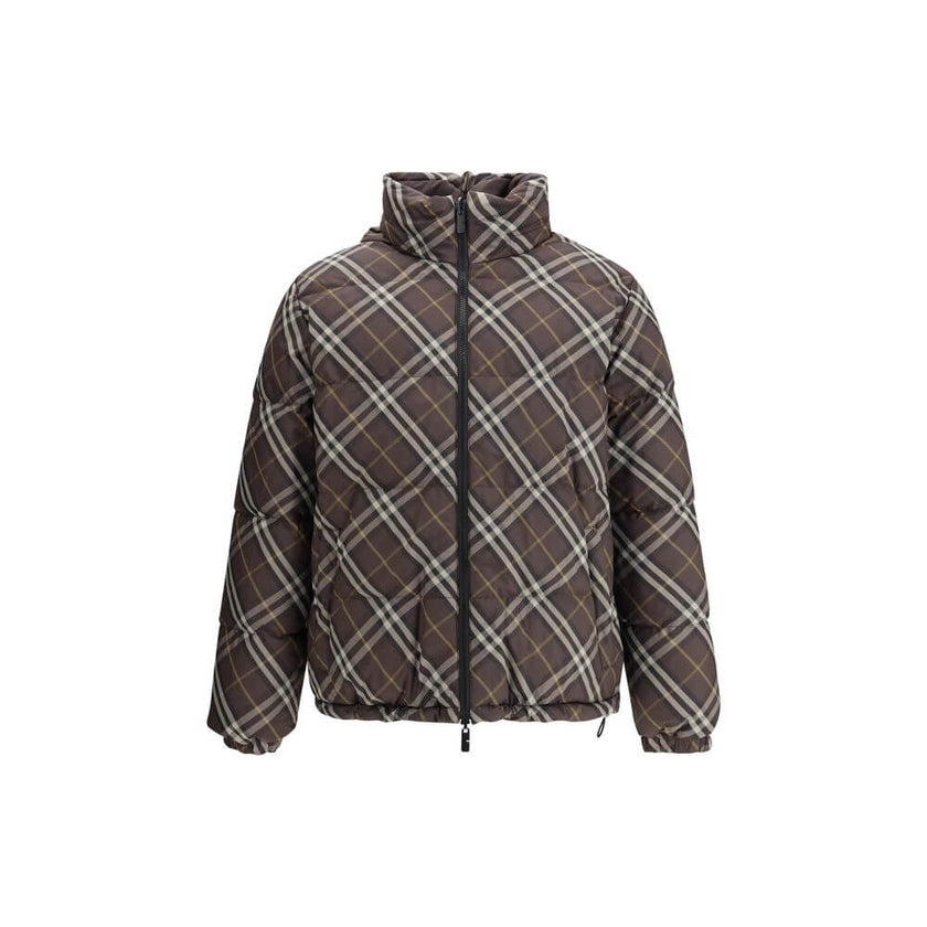 Brown Polyester CoatThe Reversible Check Snowdon Puffer Jacket by Burberry is a down-filled jacket crafted from goose down and feathers, cut to a relaxed fit for comfort and ease. Its reversible design transitions from the classic Burberry Check to a soli