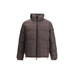Brown Polyester CoatThe Reversible Check Snowdon Puffer Jacket by Burberry is a down-filled jacket crafted from goose down and feathers, cut to a relaxed fit for comfort and ease. Its reversible design transitions from the classic Burberry Check to a soli