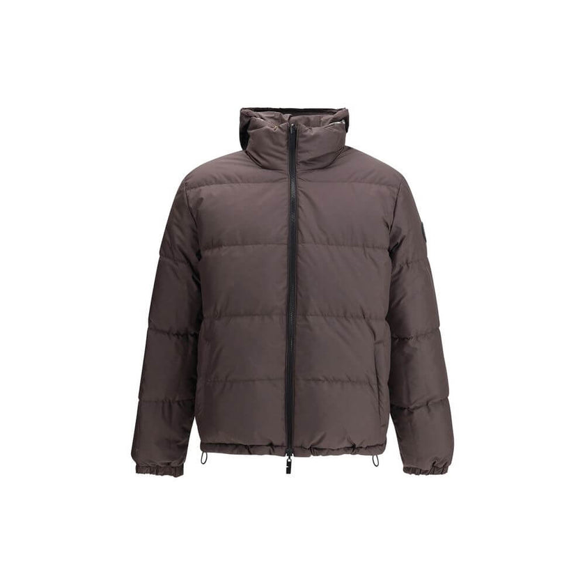 Brown Polyester CoatThe Reversible Check Snowdon Puffer Jacket by Burberry is a down-filled jacket crafted from goose down and feathers, cut to a relaxed fit for comfort and ease. Its reversible design transitions from the classic Burberry Check to a soli