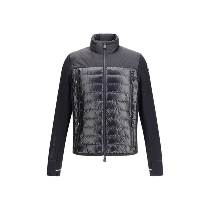 Black Polyester Shell JacketThe padded Polartec® zip-up Jacket by Moncler Grenoble designed for superior comfort and performance in outdoor and mountain settings. Crafted with down-feather filling and a quilted structure, it ensures warmth and lightness.