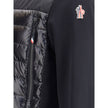 Black Polyester Shell JacketThe padded Polartec® zip-up Jacket by Moncler Grenoble designed for superior comfort and performance in outdoor and mountain settings. Crafted with down-feather filling and a quilted structure, it ensures warmth and lightness.