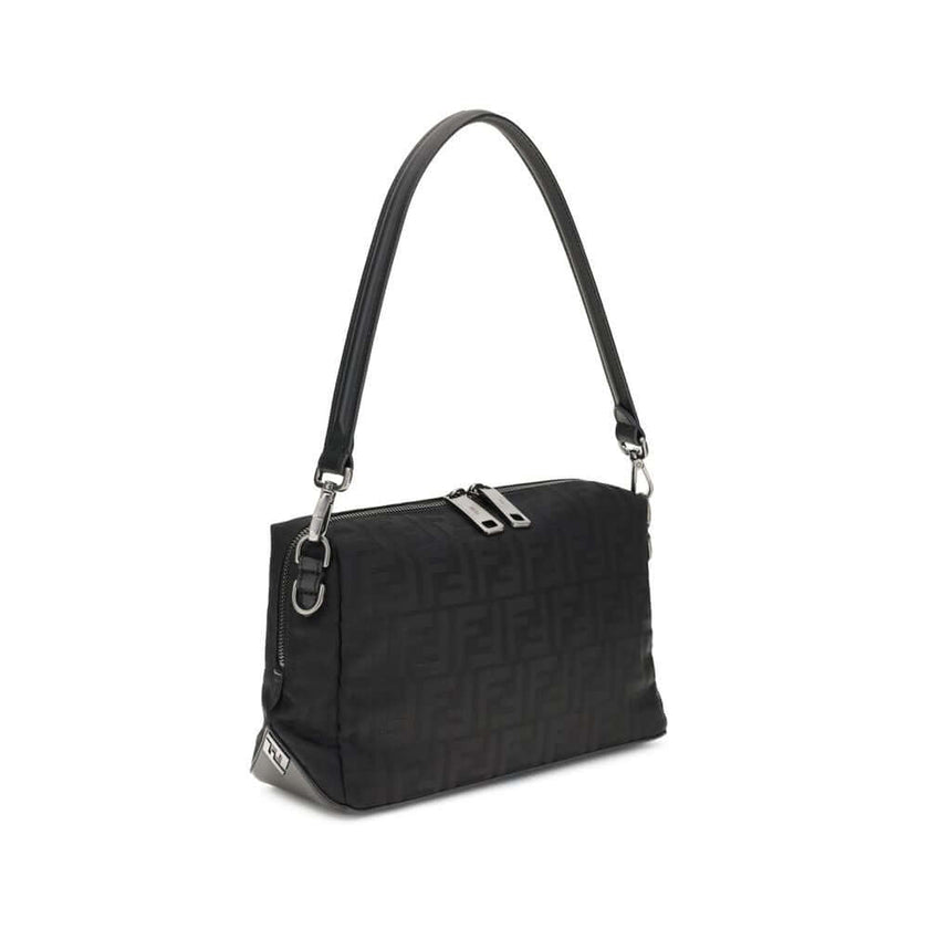 Black Nylon Shoulder BagLui medium Shoulder Bag by Fendi is a perfect balance of iconic style and contemporary functionality. Made of canvas with the unmistakable FF motif embroidered across the surface, it is enriched with elegant FF metal details placed