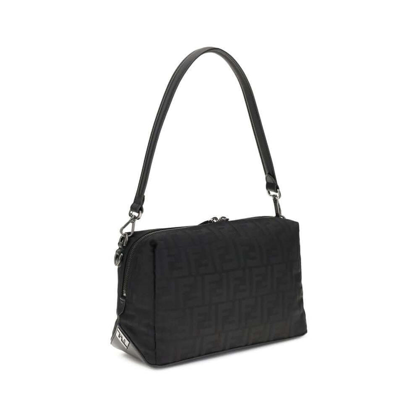 Black Nylon Shoulder BagLui medium Shoulder Bag by Fendi is a perfect balance of iconic style and contemporary functionality. Made of canvas with the unmistakable FF motif embroidered across the surface, it is enriched with elegant FF metal details placed