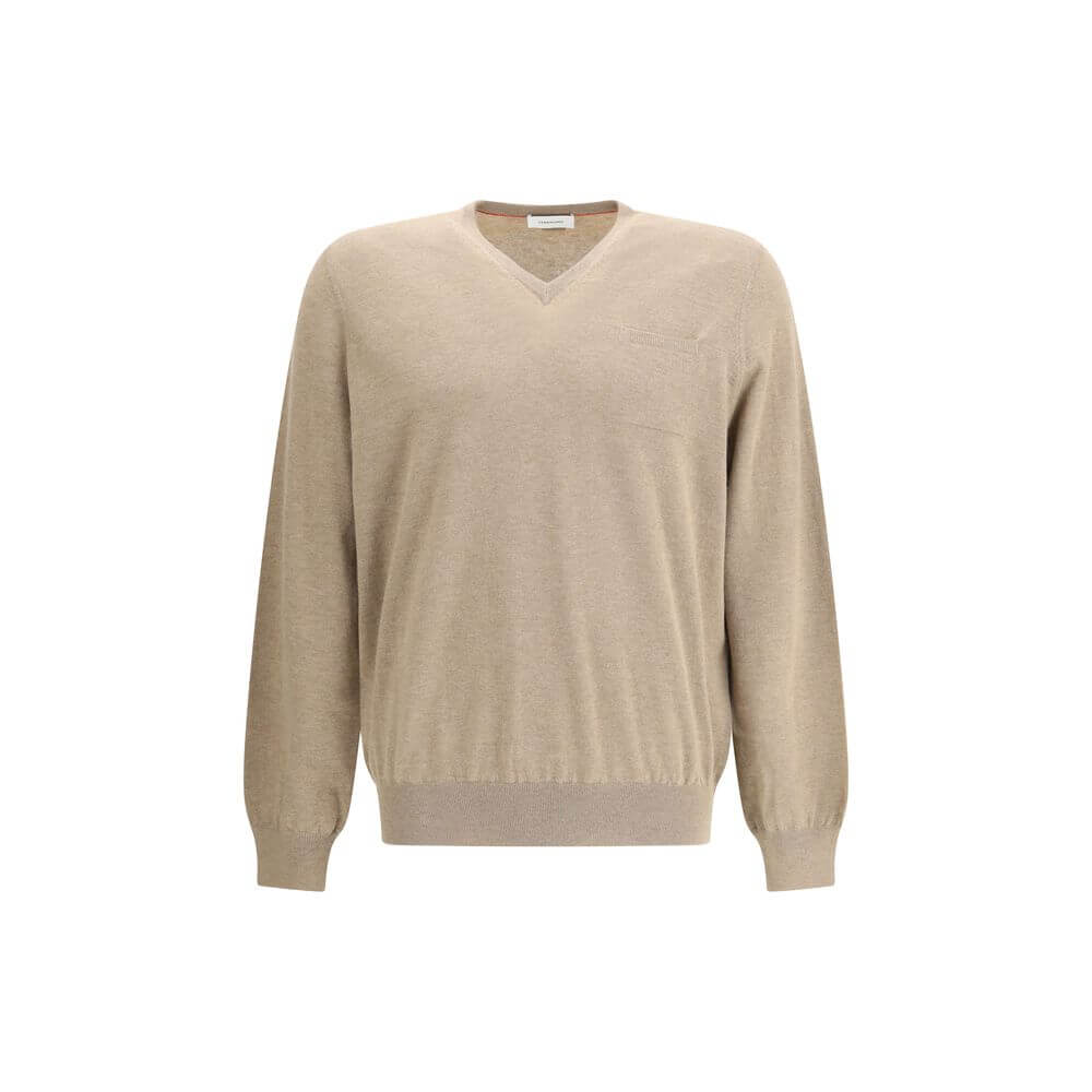 Beige Fleece Wool SweatshirtThe pocket-detail Sweater by Ferragamo is crafted from pure virgin wool with a fine, soft texture. Designed with a slightly dropped shoulder and a relaxed fit, it features an elegant V-neckline and a chest patch pocket for a re