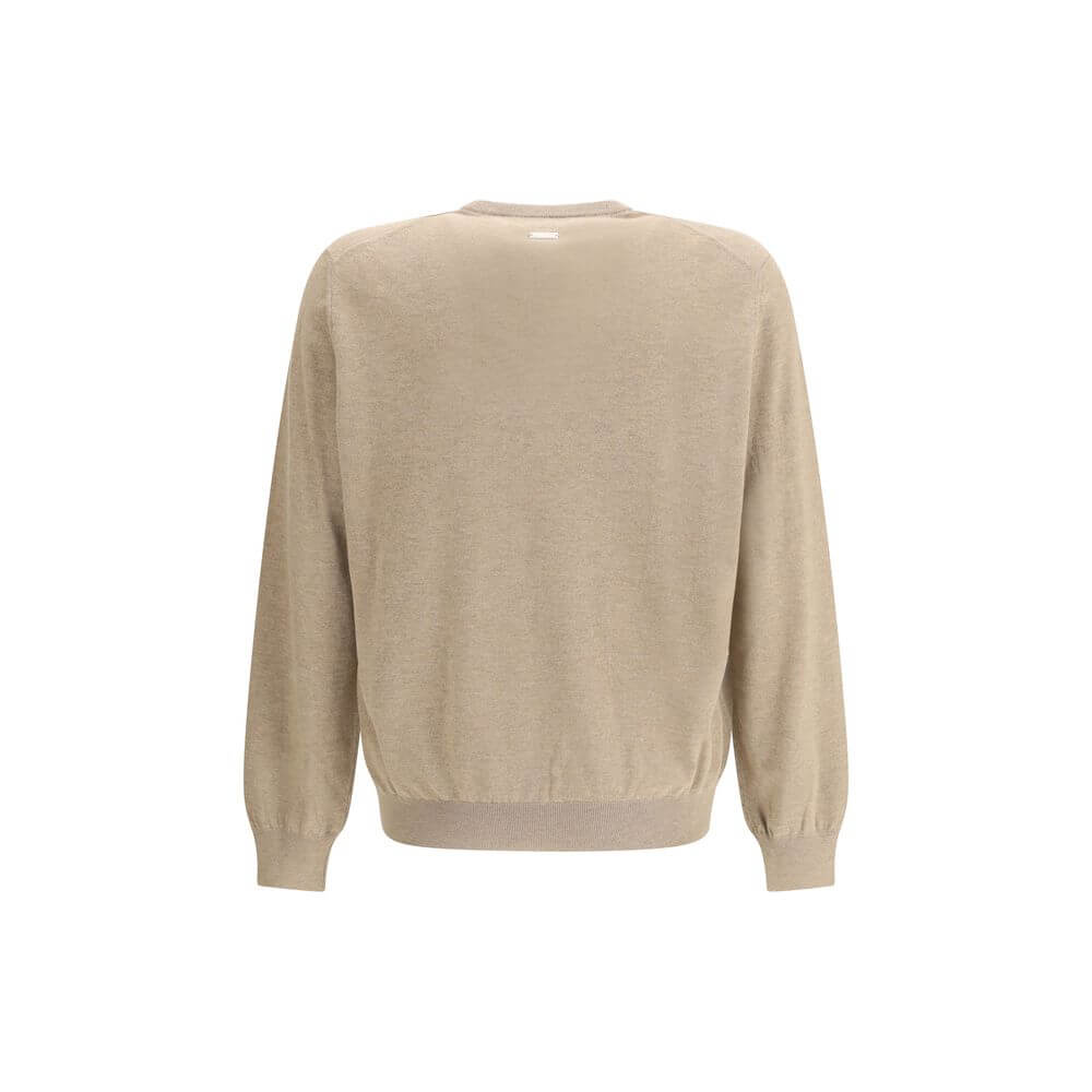 Beige Fleece Wool SweatshirtThe pocket-detail Sweater by Ferragamo is crafted from pure virgin wool with a fine, soft texture. Designed with a slightly dropped shoulder and a relaxed fit, it features an elegant V-neckline and a chest patch pocket for a re