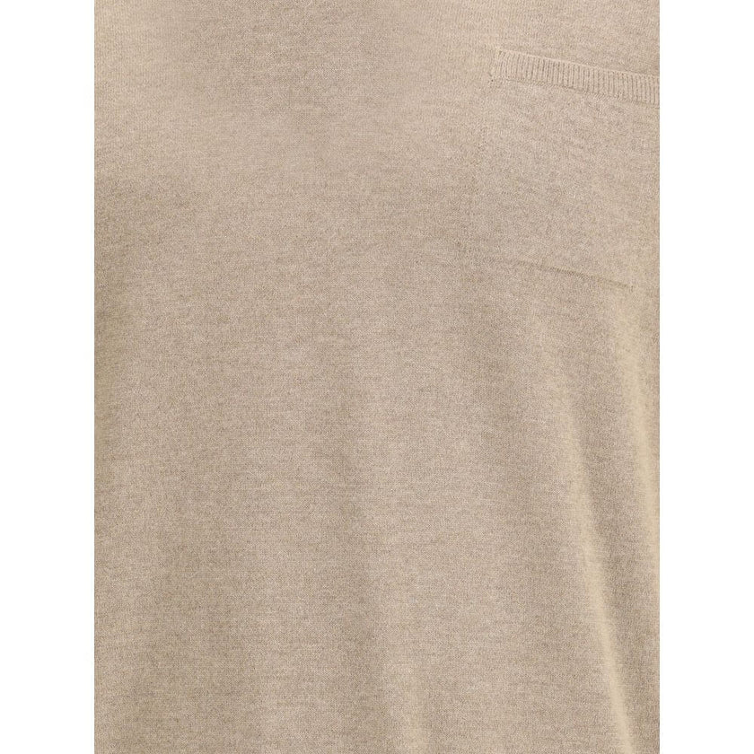 Beige Fleece Wool SweatshirtThe pocket-detail Sweater by Ferragamo is crafted from pure virgin wool with a fine, soft texture. Designed with a slightly dropped shoulder and a relaxed fit, it features an elegant V-neckline and a chest patch pocket for a re