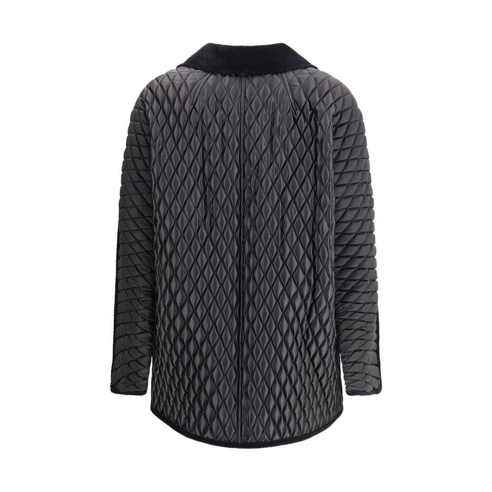 Black Polyamide Full-Length JacketThe Floriston Jacket by Burberry is crafted from quilted nylon with lightweight padding, combining functionality and contemporary style. Featuring a cropped, comfortable silhouette, it includes a shirt collar and a front