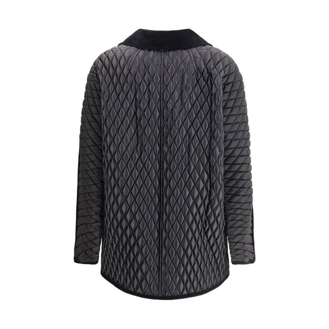 Black Polyamide Full-Length JacketThe Floriston Jacket by Burberry is crafted from quilted nylon with lightweight padding, combining functionality and contemporary style. Featuring a cropped, comfortable silhouette, it includes a shirt collar and a front