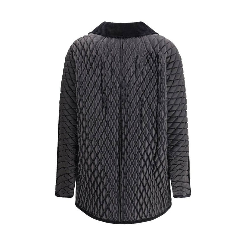 Black Polyamide Full-Length JacketThe Floriston Jacket by Burberry is crafted from quilted nylon with lightweight padding, combining functionality and contemporary style. Featuring a cropped, comfortable silhouette, it includes a shirt collar and a front