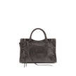 Brown Calf Leather Bos Taurus Shoulder BagBalenciaga’s Le City Medium Shoulder Bag is a high-class item made of fine lambskin leather that combines elegance and functionality. The two hand-woven leather handles lend an artisanal and refined touch, while t