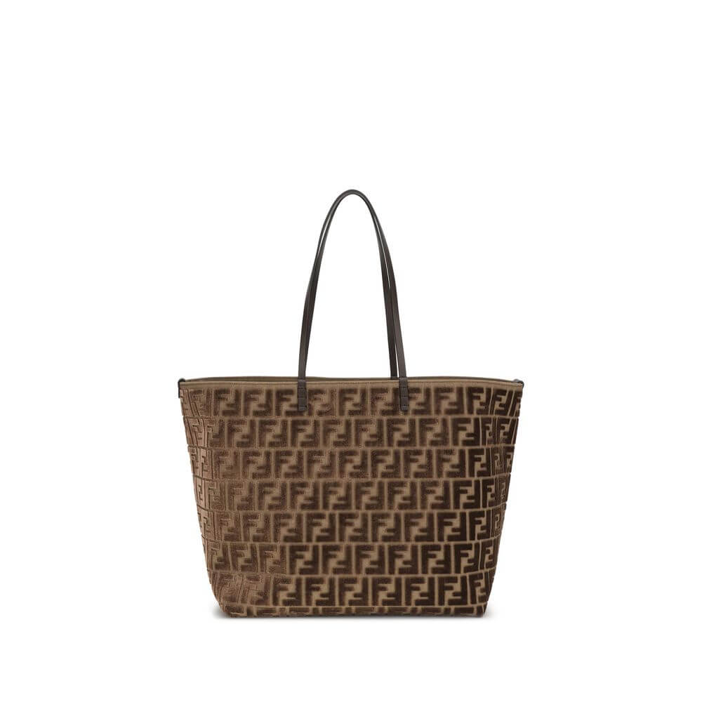 Brown Fabric Shoulder BagTote Bag by Fendi is made with the iconic FF all-over printed chenille pattern, creating a luxurious and sophisticated effect. Featuring two flat leather handles, this bag combines practicality and elegance. The interior features