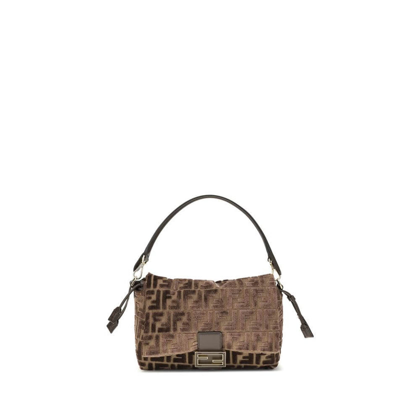 Brown Viscose Shoulder BagMedium Mamma Baguette Shoulder Bag by Fendi is made of jacquard velvet with a dark brown embossed FF pattern on a brown base. It is decorated with an FF closure with tone-on-tone leather insert and features a front flap with magn