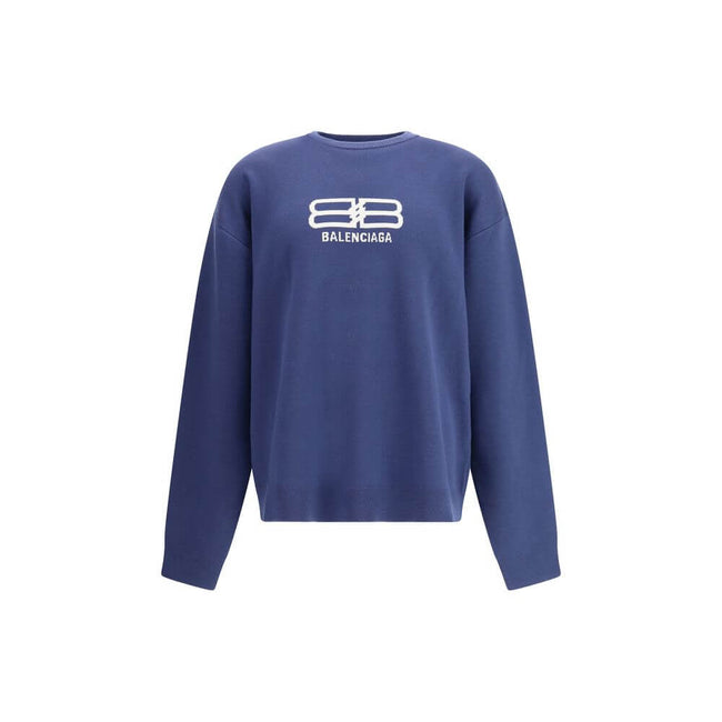 Blue Wool SweatshirtThe crewneck Sweatshirt by Balenciaga embodies the brand’s modern and minimalist aesthetic. Crafted from soft cotton, it features a relaxed fit, long sleeves, and a contrasting logo printed at the front, adding a signature touch to its