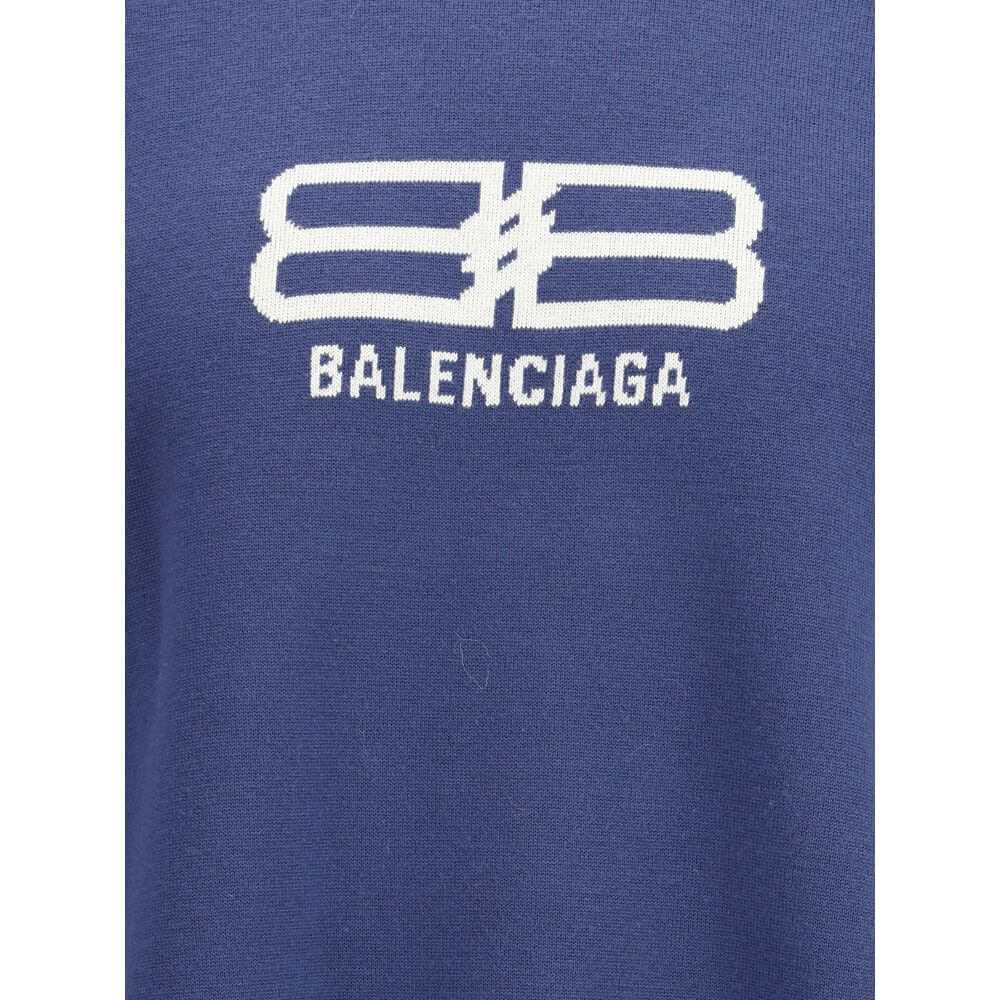 Blue Wool SweatshirtThe crewneck Sweatshirt by Balenciaga embodies the brand’s modern and minimalist aesthetic. Crafted from soft cotton, it features a relaxed fit, long sleeves, and a contrasting logo printed at the front, adding a signature touch to its