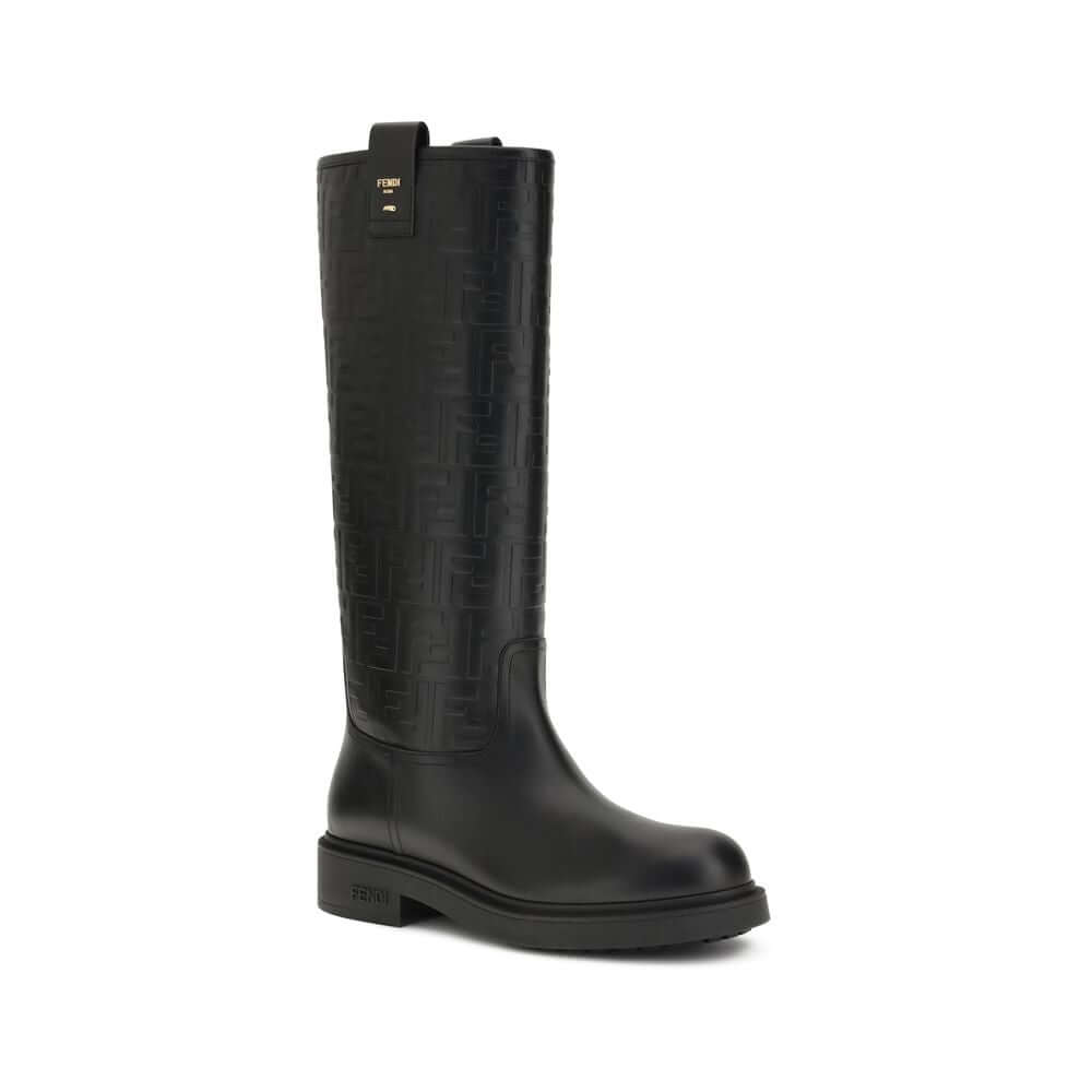 Black Calf Leather Bos Taurus Ankle BootsFilo High Boots by Fendi combine elegance and character in a bold and sophisticated design. Crafted from calfskin leather, they stand out for the embossed FF motif that wraps the shaft, embellished with a logo in m