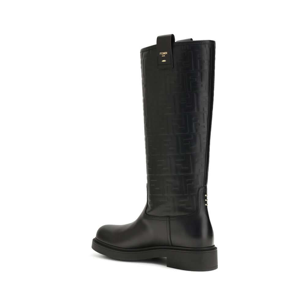 Black Calf Leather Bos Taurus Ankle BootsFilo High Boots by Fendi combine elegance and character in a bold and sophisticated design. Crafted from calfskin leather, they stand out for the embossed FF motif that wraps the shaft, embellished with a logo in m