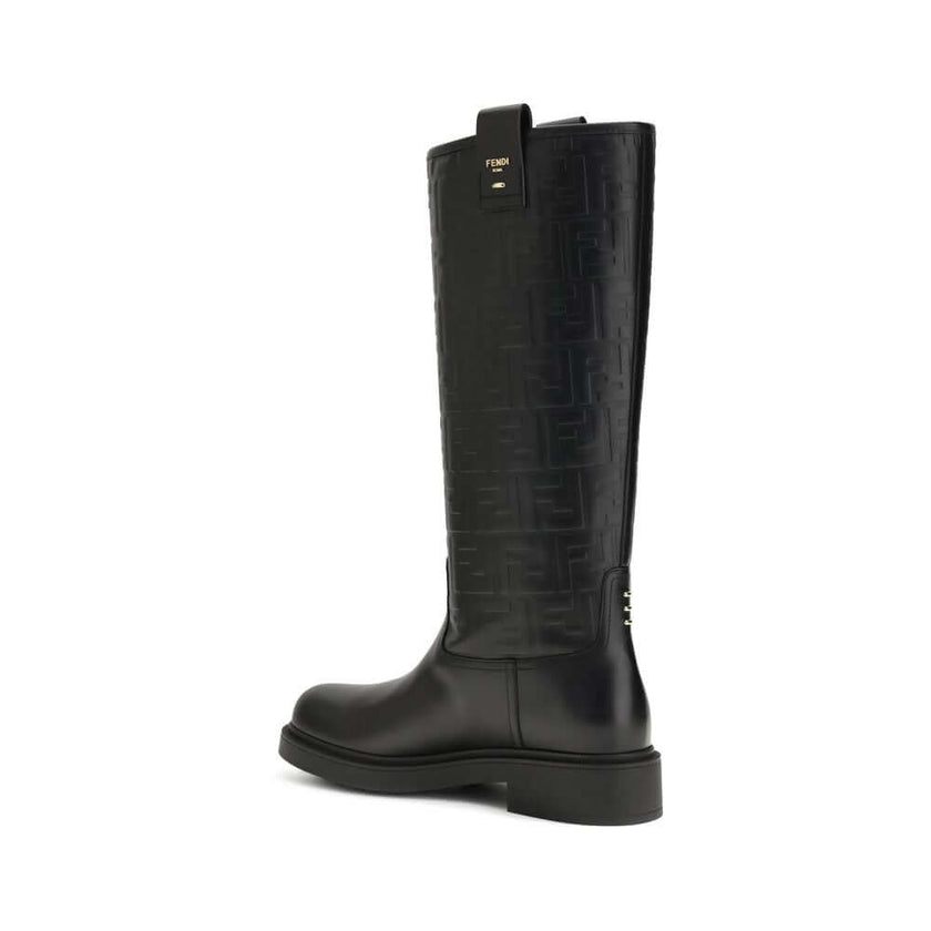 Black Calf Leather Bos Taurus Ankle BootsFilo High Boots by Fendi combine elegance and character in a bold and sophisticated design. Crafted from calfskin leather, they stand out for the embossed FF motif that wraps the shaft, embellished with a logo in m