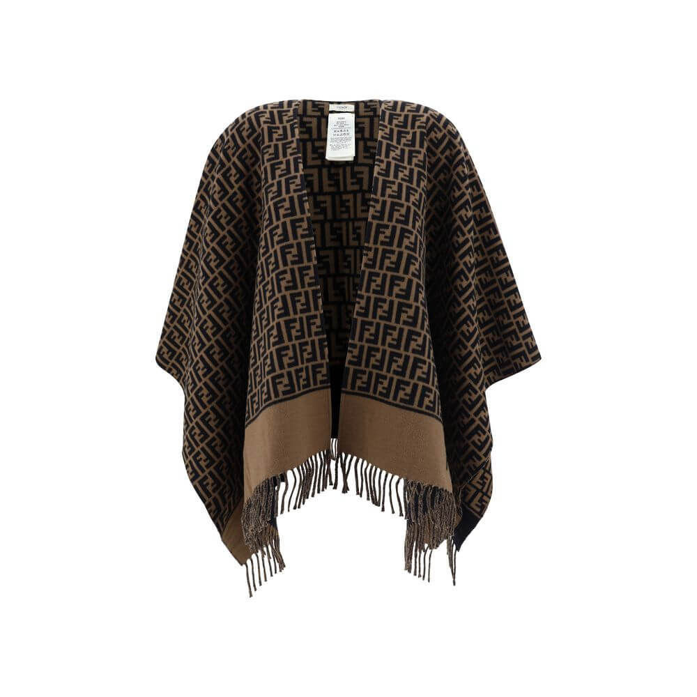 PonchoWool Poncho by Fendi, wide shawl lapels, frayed hems, brand’s iconic FF logo repeated in all-over contrast, regular fit. Season: AW25 Composition: GENERAL 100% Wool MADE IN ITALYPoncho${tagsFendiAulae Poncho FendiAulae Poncho Wool Poncho by Fendi, w