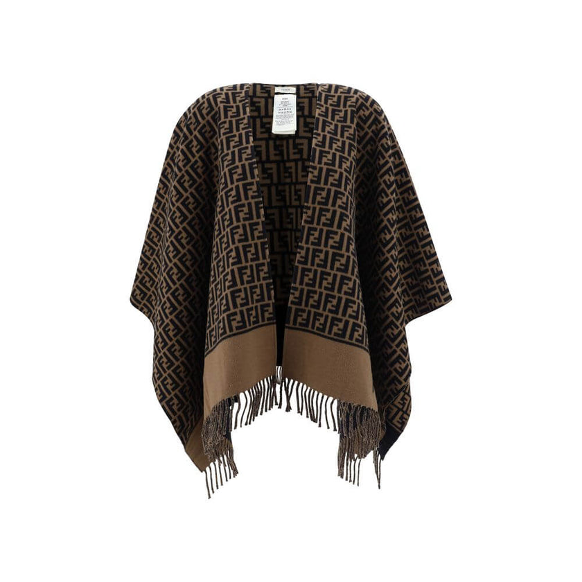 PonchoWool Poncho by Fendi, wide shawl lapels, frayed hems, brand’s iconic FF logo repeated in all-over contrast, regular fit. Season: AW25 Composition: GENERAL 100% Wool MADE IN ITALYPoncho${tagsFendiAulae Poncho FendiAulae Poncho Wool Poncho by Fendi, w