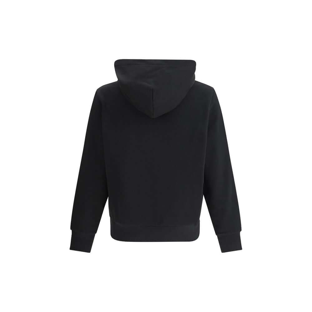 Black Cotton SweatshirtThe cotton hooded Sweatshirt by Moncler is a timeless casual essential reimagined with a distinctive touch. Crafted from soft cotton jersey, it features an adjustable hood, ribbed trims, and the iconic star-shaped logo patch on the