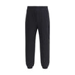 Black Cotton SweatshirtThe cotton Sweatpants by Moncler combine comfort and style in a clean, contemporary design. Made from soft cotton jersey, they feature an adjustable drawstring waist, side pockets, and a rear welt pocket. The tone-on-tone flocked lo