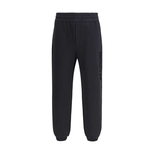 Black Cotton SweatshirtThe cotton Sweatpants by Moncler combine comfort and style in a clean, contemporary design. Made from soft cotton jersey, they feature an adjustable drawstring waist, side pockets, and a rear welt pocket. The tone-on-tone flocked lo