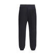 Black Cotton SweatshirtThe cotton Sweatpants by Moncler combine comfort and style in a clean, contemporary design. Made from soft cotton jersey, they feature an adjustable drawstring waist, side pockets, and a rear welt pocket. The tone-on-tone flocked lo