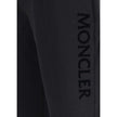 Black Cotton SweatshirtThe cotton Sweatpants by Moncler combine comfort and style in a clean, contemporary design. Made from soft cotton jersey, they feature an adjustable drawstring waist, side pockets, and a rear welt pocket. The tone-on-tone flocked lo