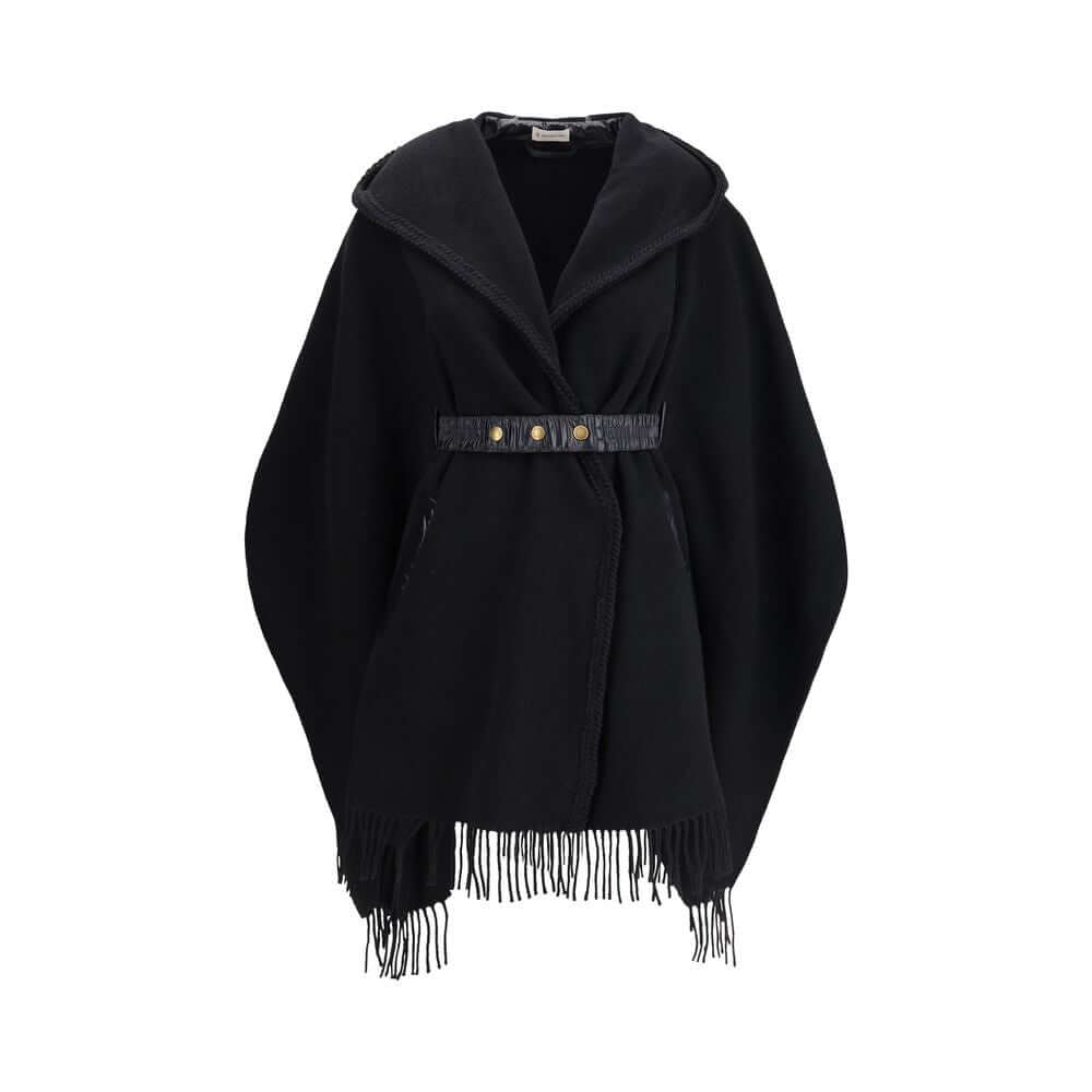 Wool CapeThe wool Cape by Moncler, defined by an elegant draped design that makes it a versatile layering piece for every season. Crafted from soft wool with light padding, it features a nylon laqué belt to define the silhouette, fringed edges, and the ic