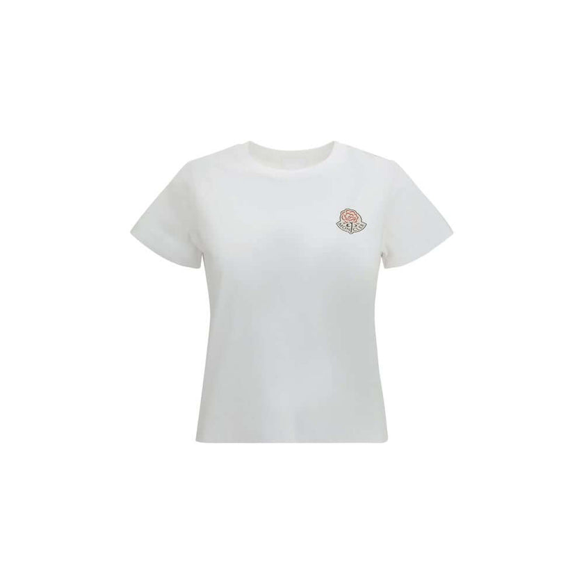 White Cotton SportswearThe logo cotton T-shirt by Moncler is a versatile wardrobe essential that embodies the brand’s clean and modern style. Crafted from pure cotton, it features a crew neck, short sleeves, and a printed logo that highlights Moncler’s ic