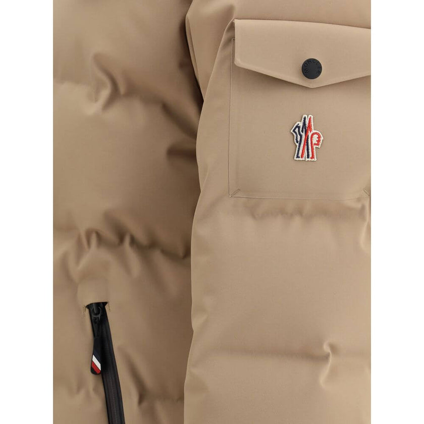 Beige Polyamide Full-Length JacketThe Moncler Grenoble Montgetech Ski Down Jacket with Hood, designed for peak performance in skiing and snowboarding. Crafted from 2L 4-way stretch nylon, it provides exceptional flexibility and weather resistance. The pad
