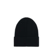 Black Fleece Wool BeanieBeanie Hat by Moncler Grenoble combines functionality and style in an essential cold-weather accessory. Made with ribbed fabrication, it offers a snug and comfortable fit. The Moncler Grenoble logo sewn on the front adds a distinct