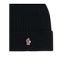 Black Fleece Wool BeanieBeanie Hat by Moncler Grenoble combines functionality and style in an essential cold-weather accessory. Made with ribbed fabrication, it offers a snug and comfortable fit. The Moncler Grenoble logo sewn on the front adds a distinct