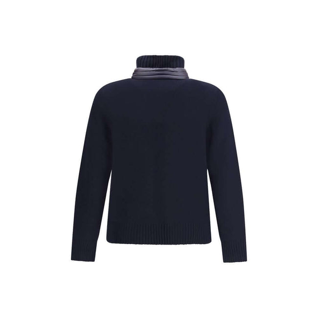 Panelled JacketThe panelled Jacket by Moncler Grenoble crafted from a wool blend, featuring a down-feather padded design that alternates quilted sections with knitted panels. It comes with a high neck, front zip fastening, long sleeves, and ribbed cuffs a