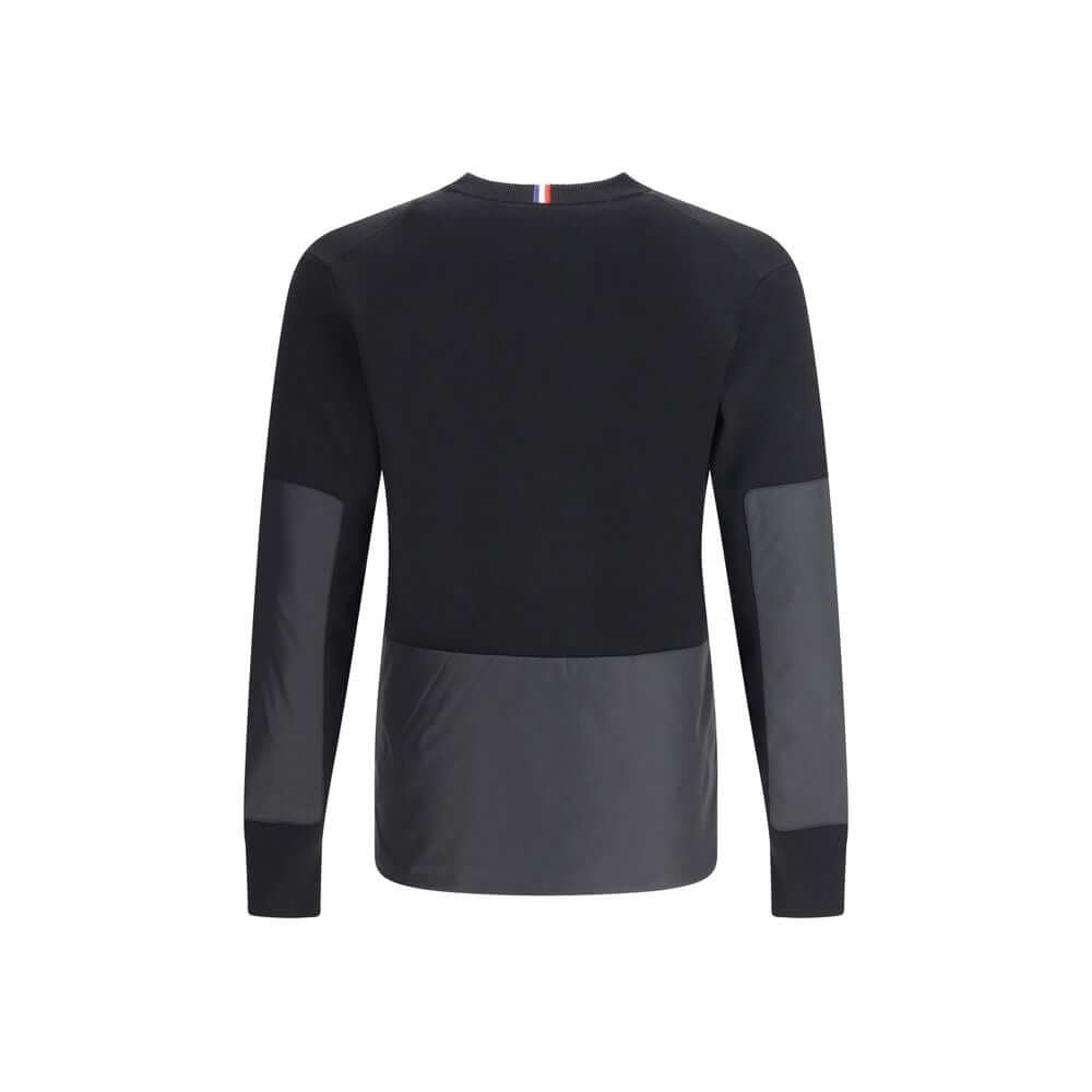 Black Polyamide SweatshirtThe panelled Sweater by Moncler Grenoble combines technical performance with refined craftsmanship. Made from a soft wool blend with padded inserts, it features a knitted construction enhanced by contrasting technical panels that