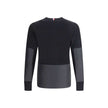Black Polyamide SweatshirtThe panelled Sweater by Moncler Grenoble combines technical performance with refined craftsmanship. Made from a soft wool blend with padded inserts, it features a knitted construction enhanced by contrasting technical panels that