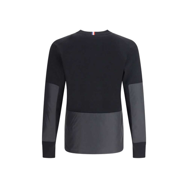 Black Polyamide SweatshirtThe panelled Sweater by Moncler Grenoble combines technical performance with refined craftsmanship. Made from a soft wool blend with padded inserts, it features a knitted construction enhanced by contrasting technical panels that
