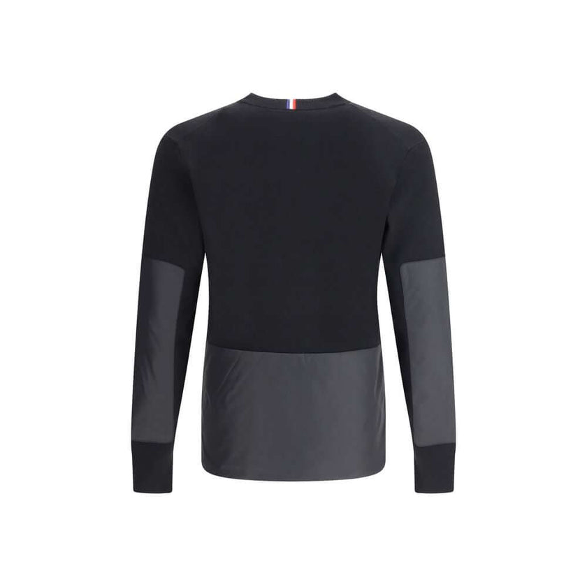 Black Polyamide SweatshirtThe panelled Sweater by Moncler Grenoble combines technical performance with refined craftsmanship. Made from a soft wool blend with padded inserts, it features a knitted construction enhanced by contrasting technical panels that