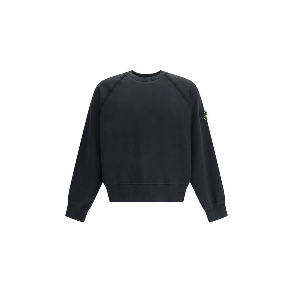 Cotton Crew neck SweatshirtThe Crew neck Sweatshirt by Stone Island is crafted from brushed organic cotton, offering a soft feel and a sustainable approach. Its design features raglan sleeves, overlock seams, and stretch ribbed finishes at cuffs and strai