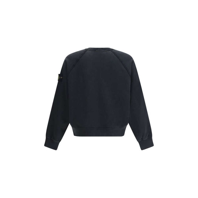 Cotton Crew neck SweatshirtThe Crew neck Sweatshirt by Stone Island is crafted from brushed organic cotton, offering a soft feel and a sustainable approach. Its design features raglan sleeves, overlock seams, and stretch ribbed finishes at cuffs and strai