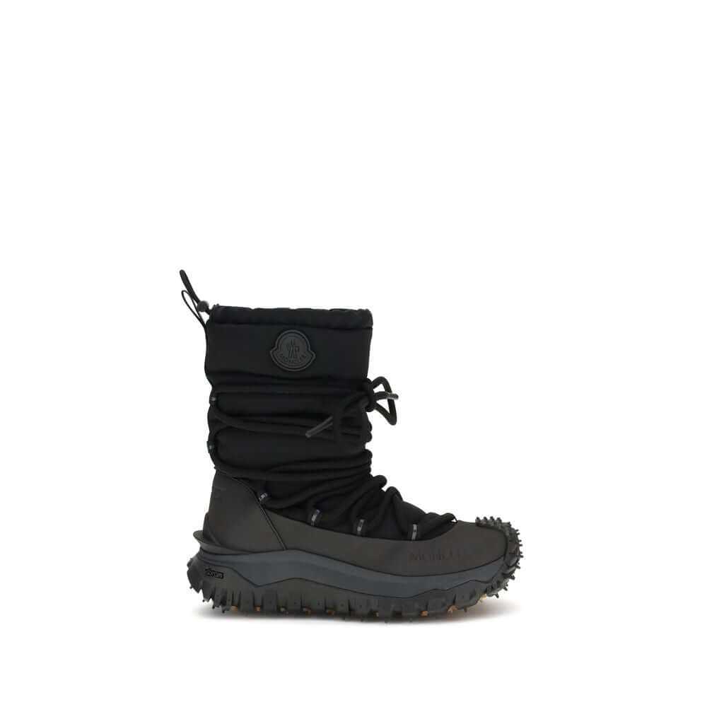 Black Polyamide Lace-Up BootsTrailgrip Après high Boots by Moncler are designed to tackle the most extreme conditions with style and functionality. The upper combines technical nylon and textured rubber for optimal protection, while the GORE-TEX membrane