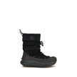 Black Polyamide Lace-Up BootsTrailgrip Après high Boots by Moncler are designed to tackle the most extreme conditions with style and functionality. The upper combines technical nylon and textured rubber for optimal protection, while the GORE-TEX membrane