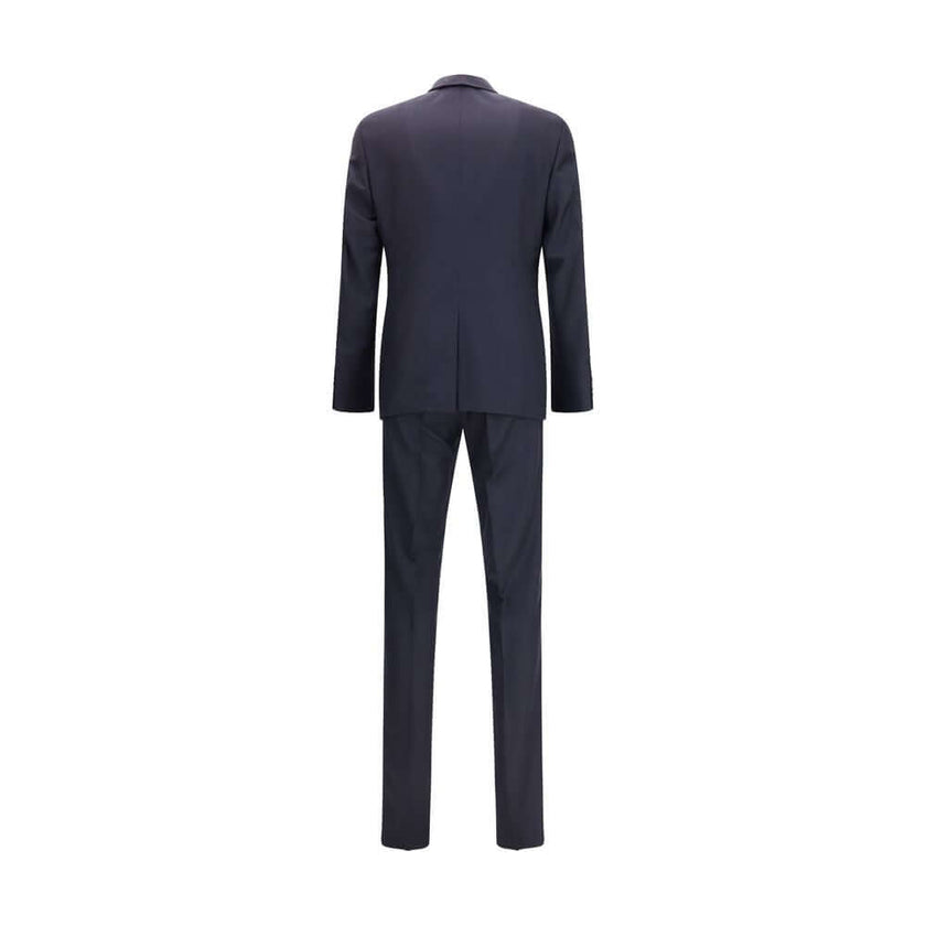 Blue Fleece Wool Two-Piece SuitThe single-breasted wool and cashmere Suit by Prada exemplifies refined tailoring and timeless sophistication. Crafted from a luxurious blend of wool and cashmere, it features a slim fit and meticulous attention to detail. T