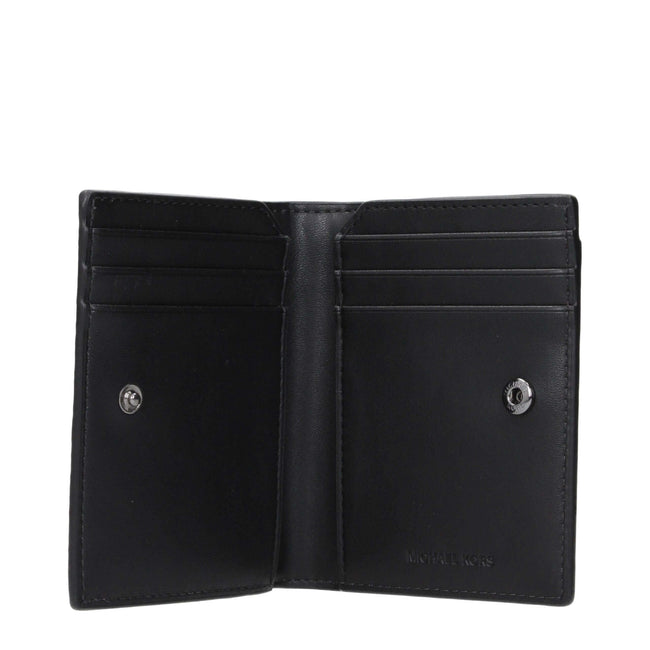 Black Leather CardholderDescription: The product with MPN 36S5LCOF3LBLACK and code F85086 leather in black is a document holders designed by Michael Kors. It has features like front logo.Black Leather Cardholder${tagsMichael KorsAulae Black Leather Cardho