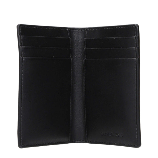 Black Fabric CardholderDescription: The product with MPN 36S5LCOD1UBLACK and code F85087 fabric in black is a document holders designed by Michael Kors. It has features like front logo.Black Fabric Cardholder${tagsMichael KorsAulae Black Fabric Cardholder
