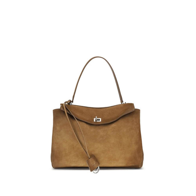 Brown Calf Leather Bos Taurus Shoulder BagThe Medium Rodeo Bag by Balenciaga blends sophistication and practicality with its combination of waxed suede calfskin and smooth leather. It features a top handle and a detachable shoulder strap for versatile car