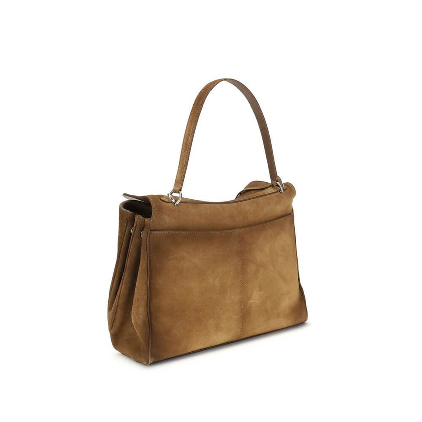 Brown Calf Leather Bos Taurus Shoulder BagThe Medium Rodeo Bag by Balenciaga blends sophistication and practicality with its combination of waxed suede calfskin and smooth leather. It features a top handle and a detachable shoulder strap for versatile car